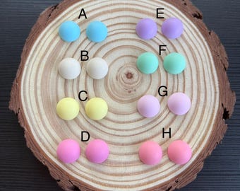 Pair of dome shaped matte cabochons