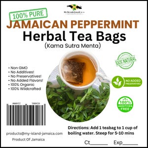 May include: A white teacup with a tea bag steeping in amber tea, surrounded by fresh green herbs. The label reads "Jamaican Peppermint Herbal Tea Bags" and includes text about the product's natural and organic qualities.