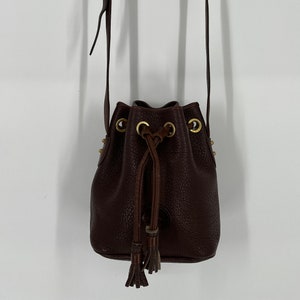 Dooney and bourke bucket bag top