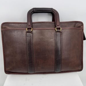 Cartera con asa marrón Coach vintage de los años 70 y 80. Fabricada en Nueva York. Consulte la descripción del artículo para conocer las medidas y los detalles.