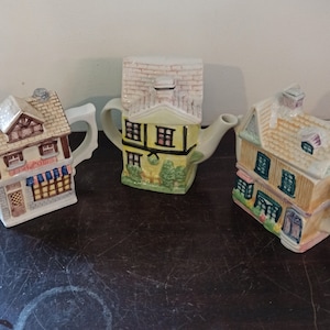 Vintage Novelty Cottage Teapots.  Set of Three. All in Good Overall Condition.