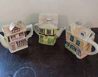 Vintage Novelty Cottage Teapots.  Set of Three. All in Good Overall Condition.