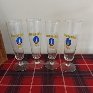This set of 4 Krombacher Pils Short Stem Glasses.
