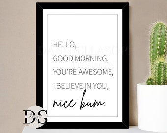 May include: Black and white framed print with the text "HELLO, GOOD MORNING, YOU'RE AWESOME, I BELIEVE IN YOU, nice bum."