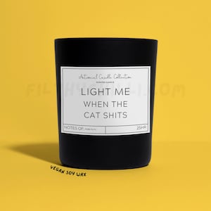 Funny Light Me When The Cat Shits Candle. French Vanilla Scent with a Black Glass Container Jar. Made with Vegan Friendly Soy Wax