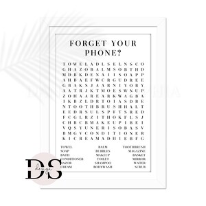 May include: A black and white printable word search puzzle with the words "Forget Your Phone?" at the top. The puzzle includes words related to bathroom and beauty products, such as "towel", "soap", "body wash", "makeup", "toothbrush", and "shampoo".