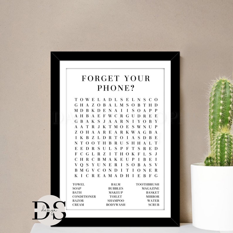 May include: A black and white printable word search puzzle with the title "Forget Your Phone?" The puzzle includes words related to bathroom and personal care items, such as towel, soap, bath, conditioner, razor, cream, balm, bubbles, makeup, toilet, shampoo, body wash, toothbrush, magazine, basket, mirror, water, and scrub.