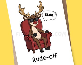 May include: A greeting card featuring a cartoon reindeer wearing sunglasses and sitting in a red armchair. A speech bubble says "SLAG". The text "Rude-olf" is printed below the reindeer.