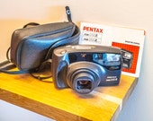 Yashica AW mini a Fully Automatic and Weatherproof 35mm film Camera 18 Pentax Zoom 105-R 35mm film camera with batteries, case instruction manual and 35mm film