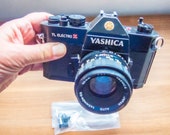 Yashica AW mini a Fully Automatic and Weatherproof 35mm film Camera 16 Yashica 35mm SLR TL Electro x. ITS Model. Working with Battery & Instruction Manual