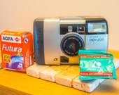 Yashica AW mini a Fully Automatic and Weatherproof 35mm film Camera 17 Minolta Vectis 200 APS film camera. Tested and complete with 2 APS films (expired) and an instruction manual