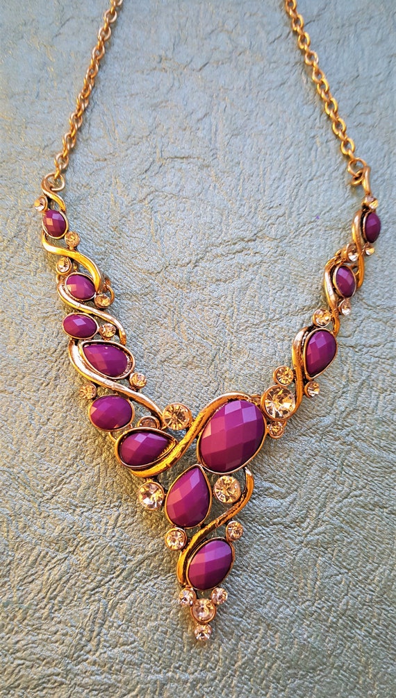 Aurora Whispers: Vintage Gold Tone & Purple Statem