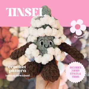 May include: A crochet pattern for a plush, gray, white, and brown Christmas tree toy. The pattern includes three body styles and trims. The pattern is called "Tinsel" and is an instant download.
