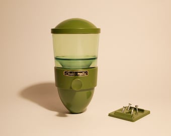 Groene, ongebruikte Caddy-Matic Junior multifunctionele dispenser (Caddy-Matic van Arthur Douglas)