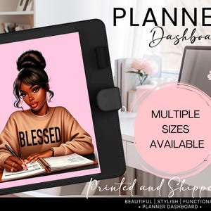 May include: A black planner dashboard with a pink background featuring an illustration of a person wearing a tan sweatshirt with the word "BLESSED". The text "PLANNER Dashboard" and "MULTIPLE SIZES AVAILABLE" are also visible.