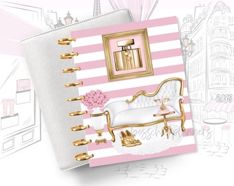 May include: A pink and white striped planner cover with a gold design featuring a perfume bottle, a white couch, and a floral arrangement. The planner cover has a gold ring binding system.