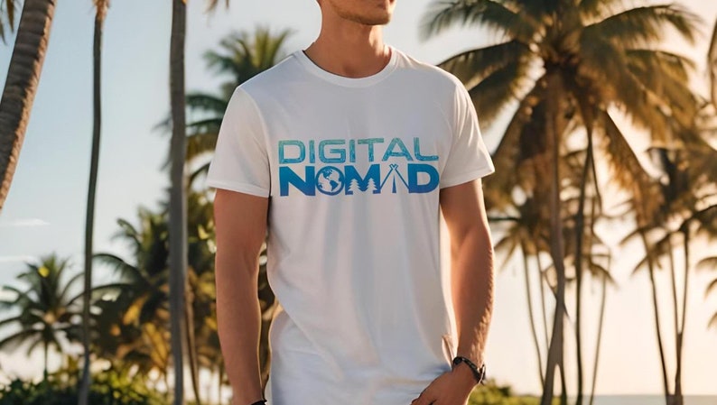 May include: White t-shirt with a blue and white gradient graphic that says "DIGITAL NOMAD". The graphic includes a globe, a tree, and a tent.