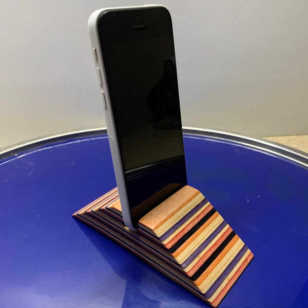Phone stand and fingerboard obstacle