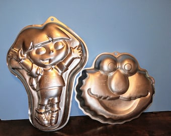 Wilton Aluminum Mold Cake Pan " Elmo Face or Dora The Explorer" Cake Pan used Sold as each