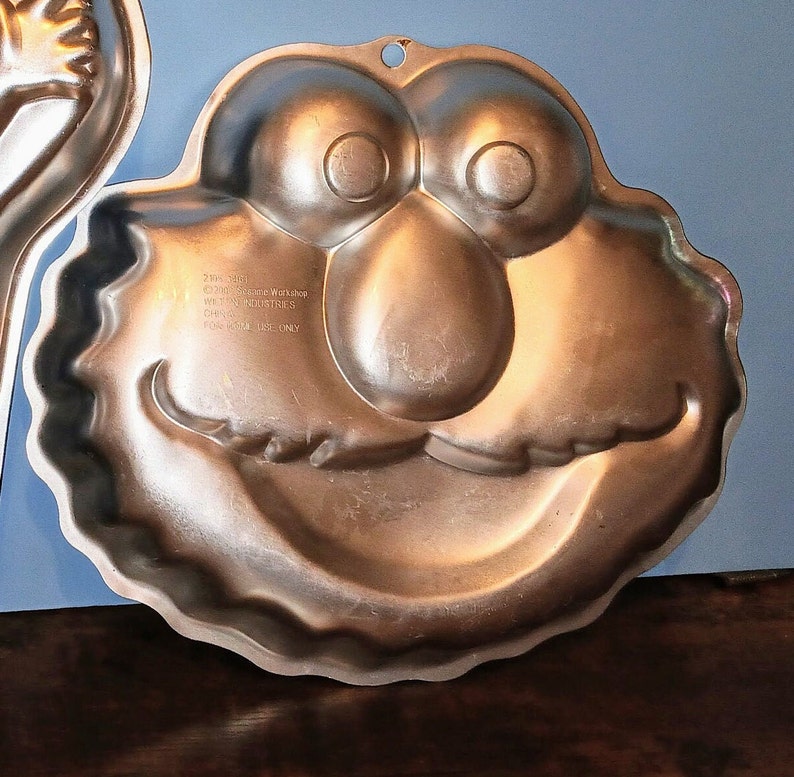 Wilton Aluminum Mold Cake Pan Elmo Face or Dora The Explorer Cake Pan used Sold as each Elmo