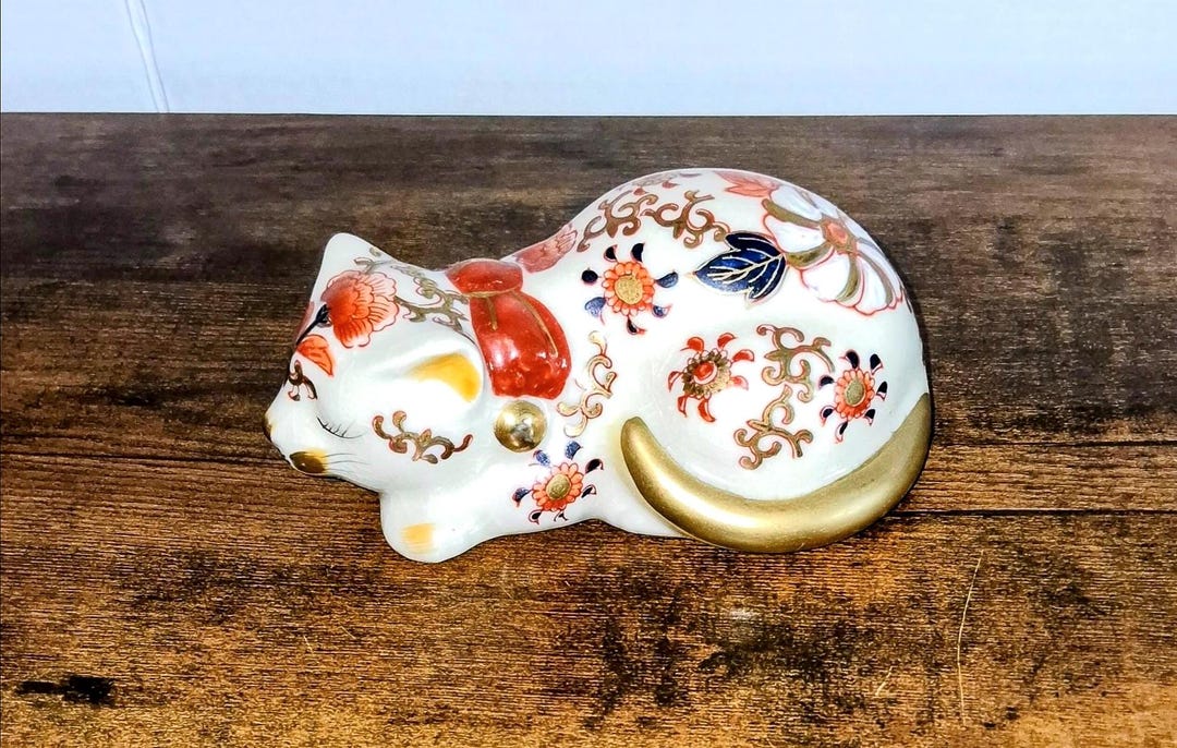 Hand Painted White Porcelain Sleeping Cat With Gold Trim With