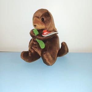 Rare Ty Beanie Original Baby  Collection Brown &quot; Seaweed&quot; Sea Otter Holding Seaweed  with Error Date of Birth March 1996 Plush 6&quot; Baby used