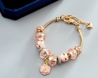 Bracelet perles et breloques fleur : chaîne serpent plaquée or rose