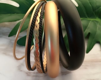 Ensemble de bracelets joncs noirs et dorés : bracelets indiens africains en métal (7 pcs)