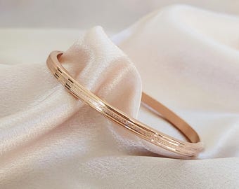 Bracelet jonc en acier inoxydable plaqué or : Bracelet clic clac recouvert de diamants