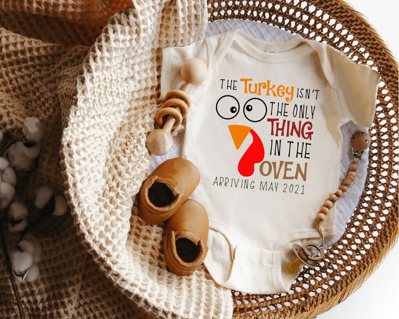 The Turkey isn/'t the only thing in the oven Pregnancy announcement Thanksgiving Fall season onesie
