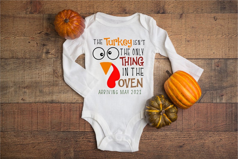 The Turkey isn/'t the only thing in the oven Pregnancy announcement Thanksgiving Fall season onesie