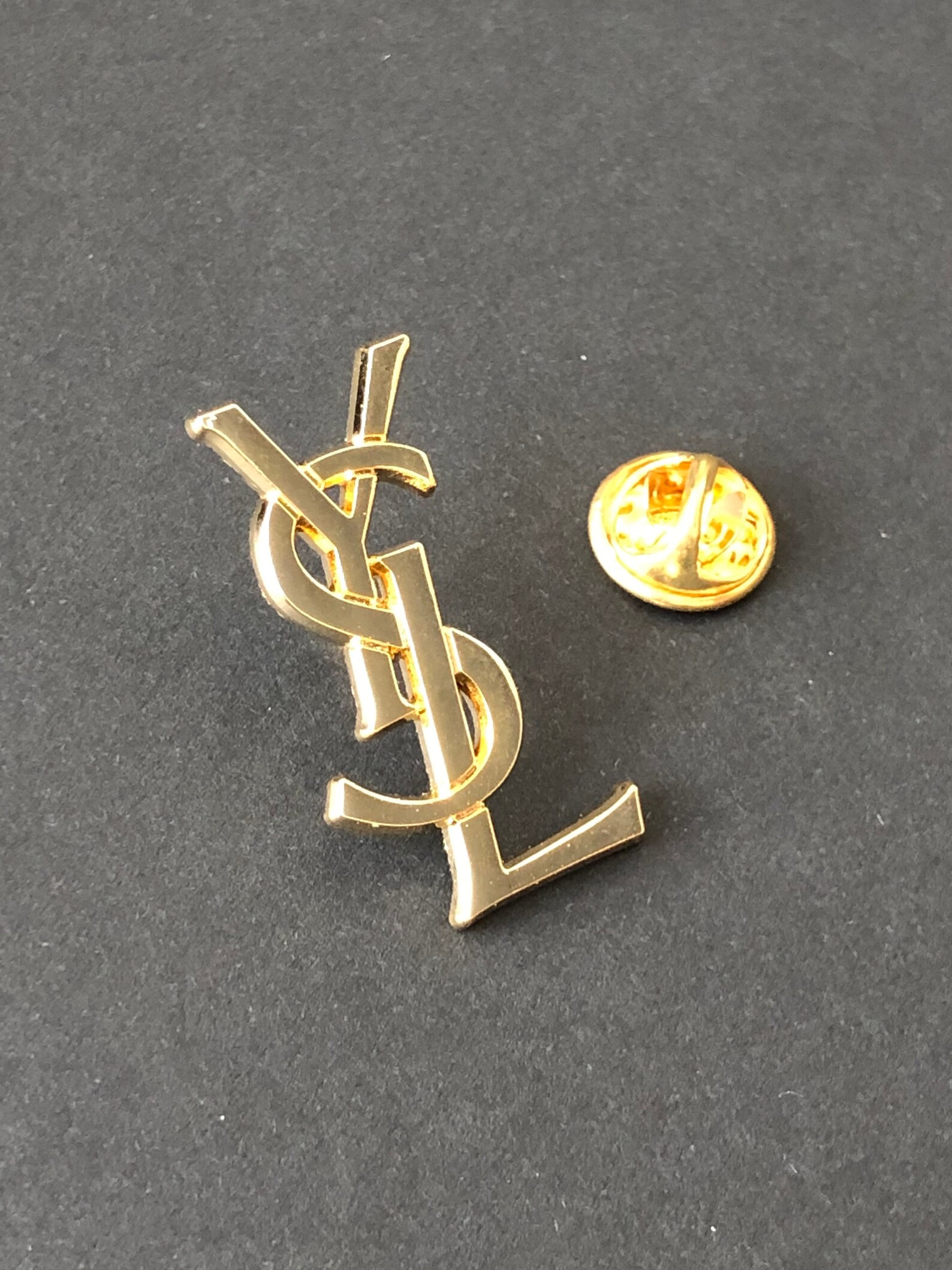 ysl badge