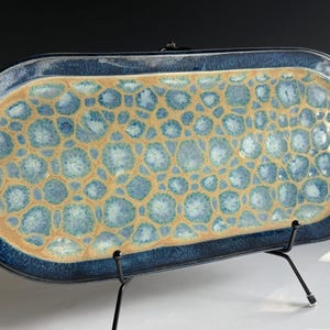 Beautiful Handmade Pottery 14 inch Serving Platter with Rich Blue and Cream Colorful Circle Glaze Design with Skull Graphic Tableware