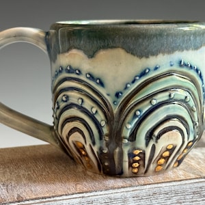 One of a kind Small Ceramic Porcelain Cup with 22k Gold Dots and Handcarved Arches. Emerald Glazed Interior 8 oz Cup. Beautiful Artisan Mug