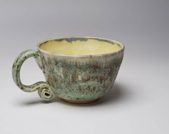 8 fl. oz. Porcelain Hand Thrown Woodgrain and yellow glazed Teacup with Curly Handle