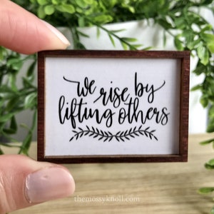 Wood Framed Miniature Sign | Farmhouse Type | Tiered Tray Décor | Handmade in U.S.A. - We Rise By Lifting Others