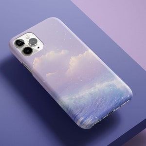 May include: A purple and blue phone case with a watercolor design of clouds and waves. The case has a white camera bump with three black lenses.