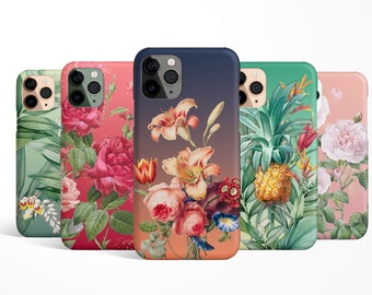 May include: Five different iPhone cases with floral and tropical designs. The cases feature a variety of flowers, including roses, lilies, and pineapples. The cases are all in different colors, including red, green, blue, and pink.