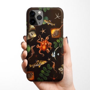 May include: A black phone case with a colorful underwater scene featuring an octopus, starfish, seahorses, and fish. The case has a dark background with green leaves and a repeating pattern.