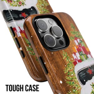 May include: A tough phone case with a wood grain design and a Christmas-themed image of a snowman with presents. The case has a cutout for the camera lens and a raised lip to protect the screen.