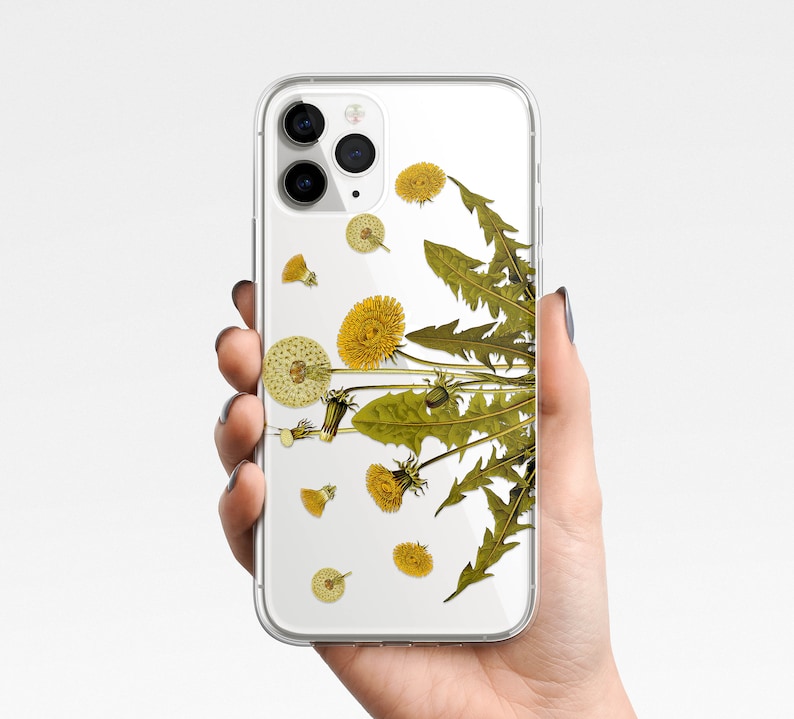 May include: A clear phone case with a design of dandelion flowers and stems in shades of green and yellow.