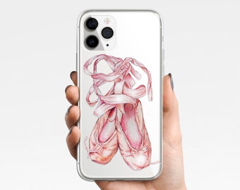 Pode incluir: Uma capa transparente para telefone com uma ilustração de aquarela rosa de dois sapatos de balé amarrados com uma fita.