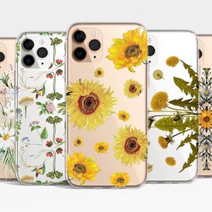 May include: Four clear phone cases with different floral designs. The cases feature sunflowers, dandelions, and a variety of other flowers in shades of yellow, white, and green.