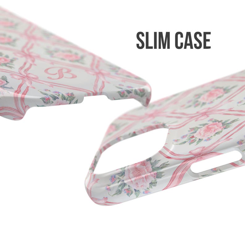 May include: A white phone case with a pink floral pattern and pink ribbons. The case has a cutout for the camera lens and a "SLIM CASE" label.