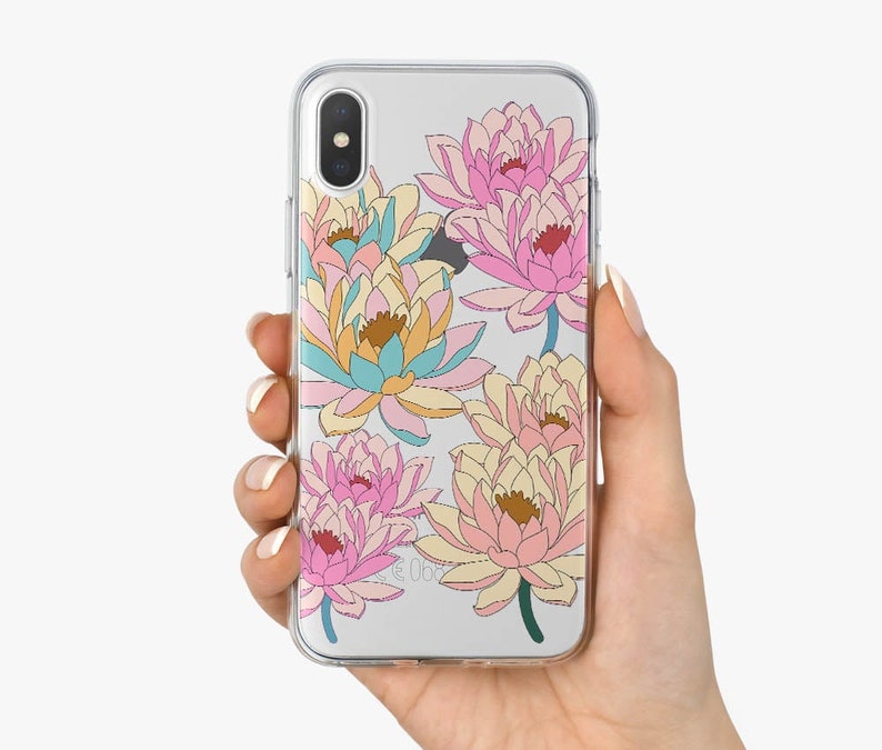 May include: A clear phone case with a floral design. The flowers are pink, yellow, and blue and have a watercolor-like appearance.