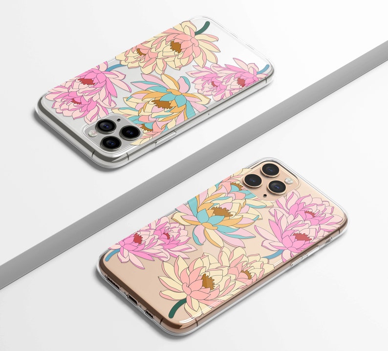 May include: Two clear phone cases with a floral design. The cases feature pink, yellow, and blue flowers on a white background. The cases are designed for an iPhone.