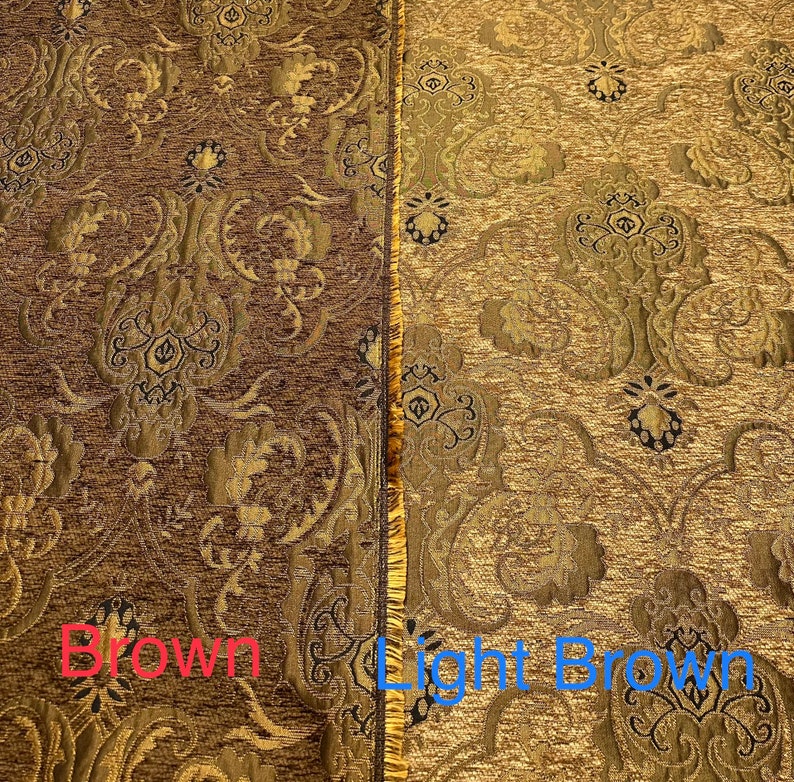May include: Close-up of two fabric swatches, one brown and one light brown. Both fabrics feature a gold and black damask pattern.