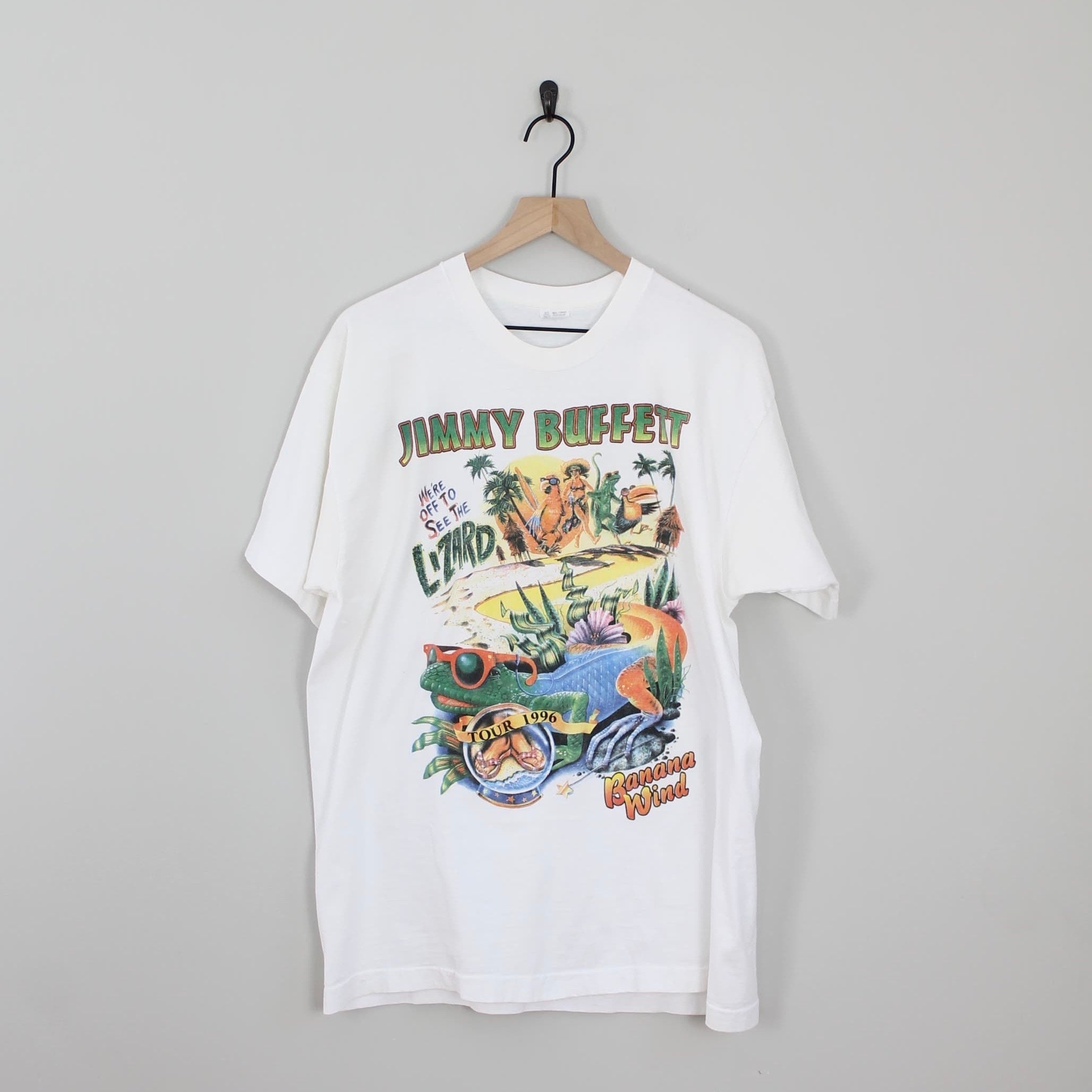 Discover Vintage 1996 Jimmy Buffett Banana Wind Lizard T-Shirt