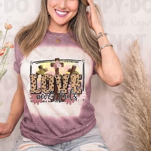 Bleached Tee—Love Never Fails Cross
