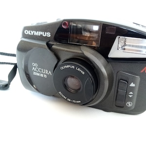 Olympus  Accura zoom XB 70